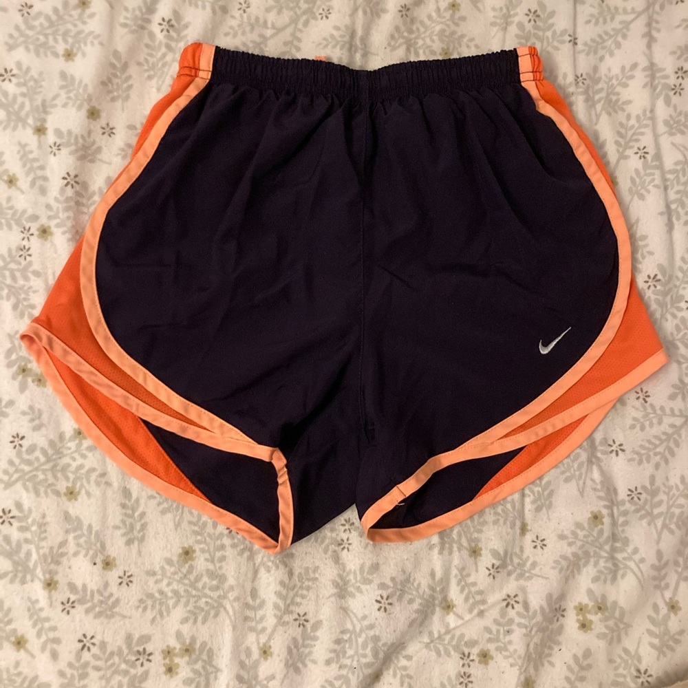 Dark purple and orange Nike shorts